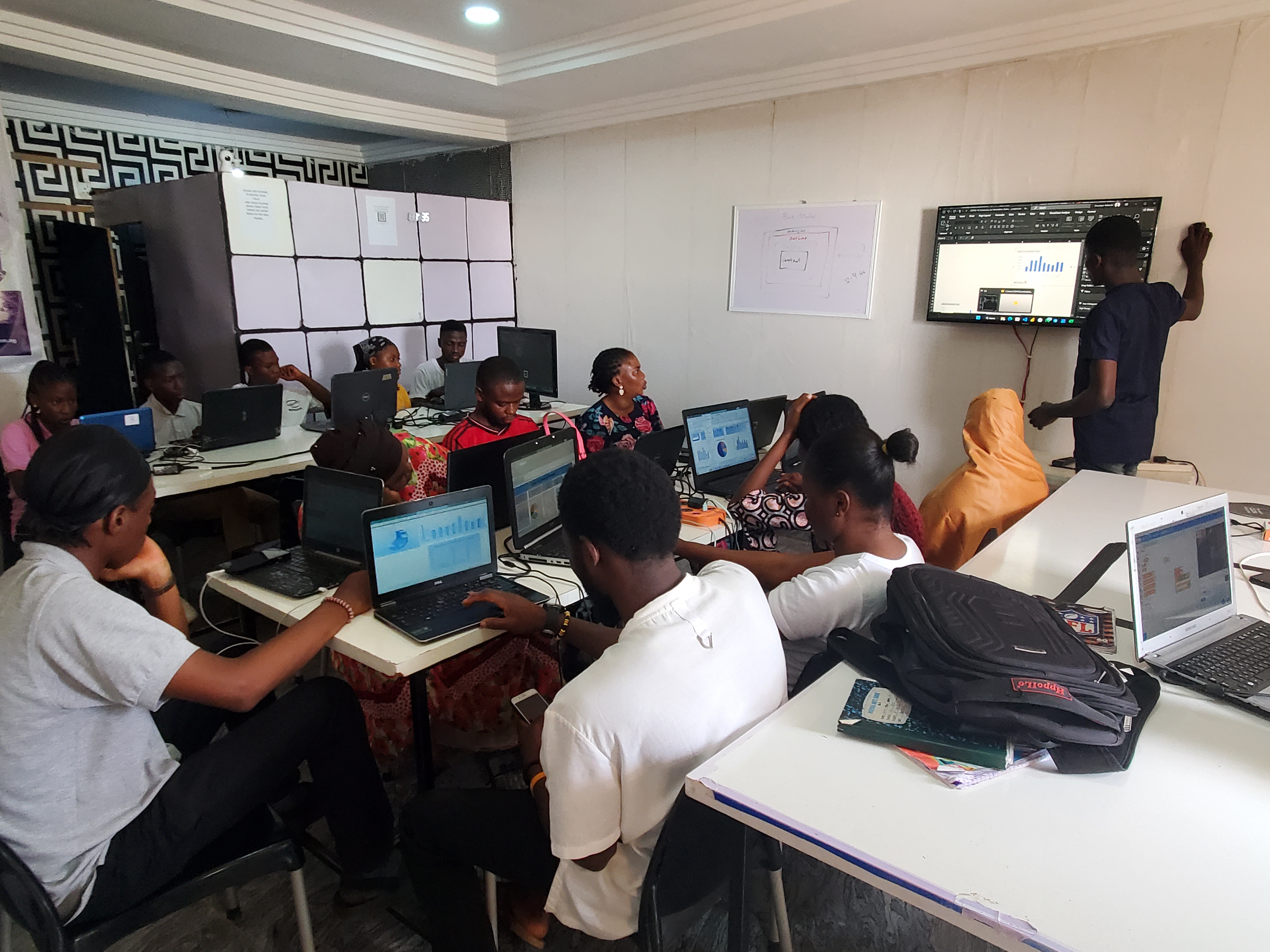 Graduates working together on an advanced portfolio project